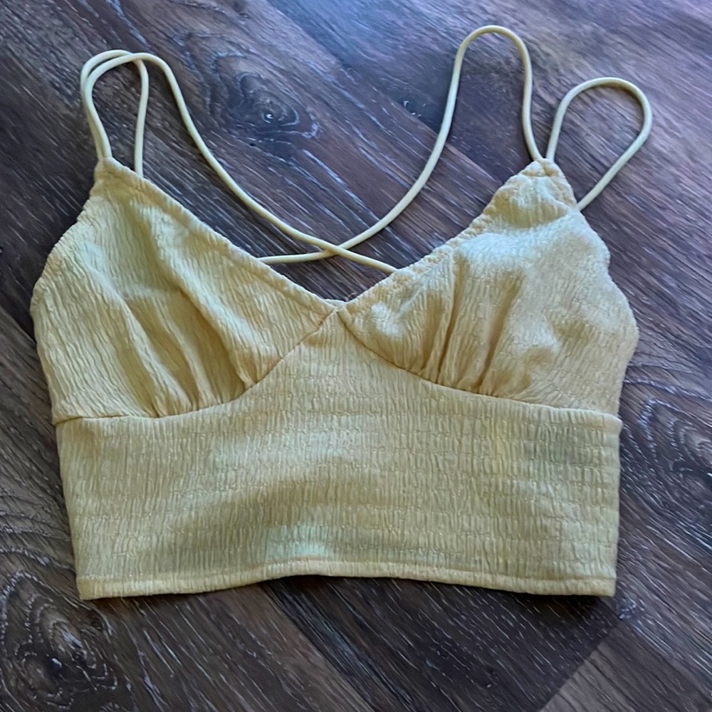 Yellow summary top, size small, crossover back, very light material, never worn